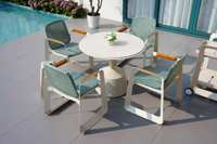 Ensemble table et chaises Osidi en alliage d'aluminium moderne, non pliable, au design technologique robuste, pour usage en extérieur, fabriqué en Chine
