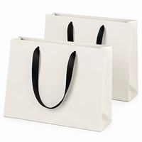 Solution d'emballage personnalisée en carton blanc pour les marques de mode, de beauté et de cadeaux, avec service d'impression haut de gamme