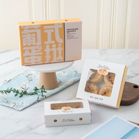 Boîte cadeau festive pour tartelettes aux œufs avec fenêtre transparente et impression élégante, idéale pour les cadeaux de fêtes et la présentation de desserts