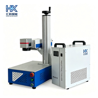 Machine de marquage laser UV de bureau Huike 5W, idéale pour la gravure d'étiquettes sur les flacons cosmétiques en verre et les articles en verre.