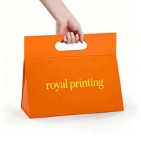 Sac en papier cadeau avec poignée magnétique orange, logo personnalisé, sac de transport en papier artistique pour l'emballage de détail