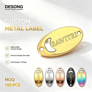Premium Embossed Metal Clothing Logo Label Custom Brand Metal Plate For Fashion Garment Handbags - Product Image 1
