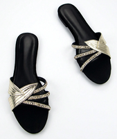 Sandales plates élégantes pour femmes avec appliques feuilles d'or et chaîne en strass, mules plates à enfiler, chaussures d'été souples pour femmes