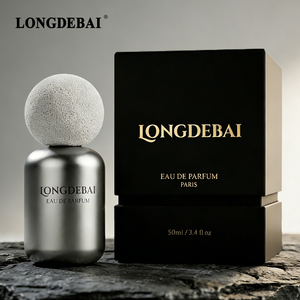 Botella de Perfume de Vidrio Plateado Mate Redonda, Personalizada y Única, de 50 ml, Vacía, con Caja de Empaque y Tapa de Roca Volcánica - Product Image 1