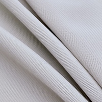 Tissu de maillot de bain en polyester élasthanne haute élasticité 87%P 13%SP 185GSM 160CM de largeur résistant au chlore pour maillots de bain et yoga