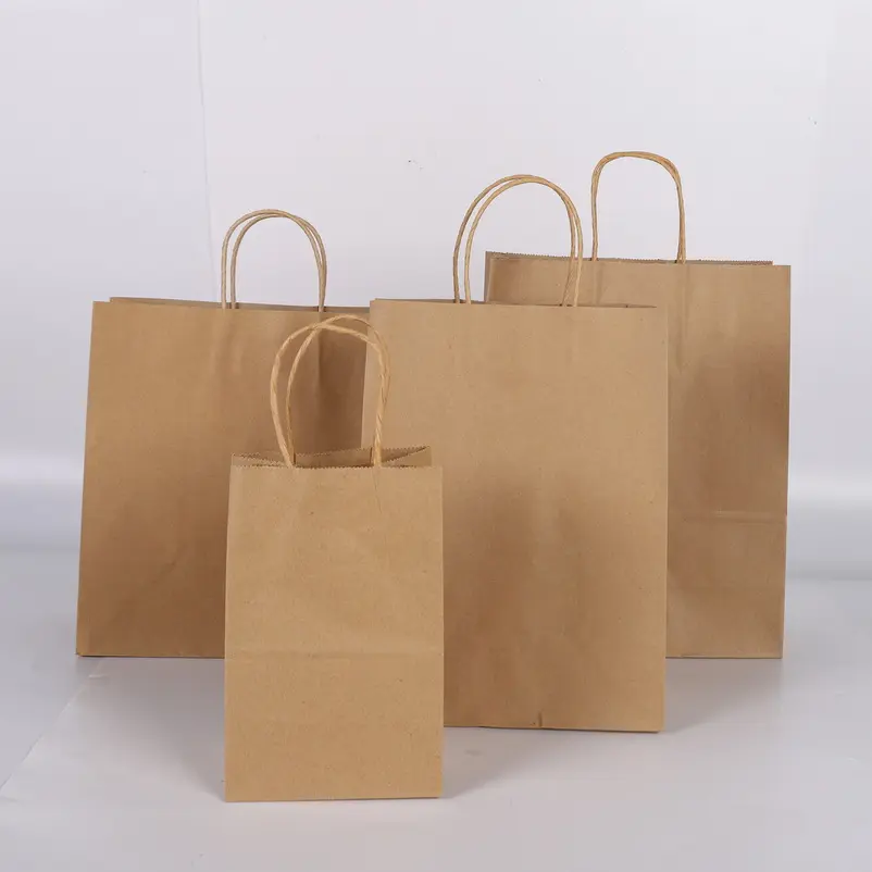 Stok Harga murah tas belanja kertas kraft ramah lingkungan bolsa de papel kemasan hadiah tas kertas kerajinan coklat dengan pegangan