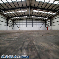Entrepôt industriel préfabriqué en acier galvanisé, construction robuste, intégrité structurelle durable, garantie de 2 ans pour villa