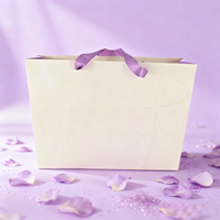 Sacs d'emballage de luxe pour boutique de vêtements violets mats biodégradables, écologiques et personnalisés Ruban en carton pour shopping avec votre propre logo