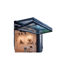 Porte de garage automatique verticale moderne pour maison intelligente, isolation thermique, construction en alliage d'aluminium et verre