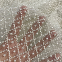 Nouveaux tissus de dentelle de mariée brodés de perles blanches lourdes