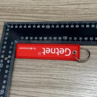 Porte-clés tissé double face personnalisé en gros avec logo en forme de lettre Mousquetons et porte-clés promotionnels directs d'usine