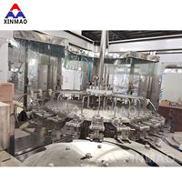 Ligne de production automatique de boissons Pasteurisateur de fruits Pomme Mangue Orange Fabrication de bouteilles de jus Remplisseuse d'embouteillage Usine