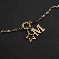 Bracelet en acier inoxydable eManco, style minimaliste avec breloques en cristal et lettres étoiles, idéal pour le quotidien, le bureau et les occasions chics.