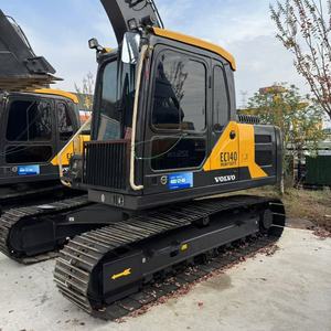 Excavatrice sur chenilles hydraulique Volvo EC140 d'occasion pour travaux de terrassement, de creusement, de chargement et d'utilisation en projet - Product Image 2
