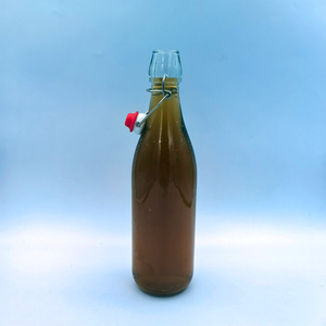 Bouteille en verre transparente ronde de 750 ml, 450 g, avec bouchon à bascule en métal, élégante, prix compétitif, fournisseur d'usine - Product Image 2