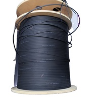 Carrete de fibra óptica FTTH para exteriores de 2 núcleos con miembro de fuerza de alambre de acero G657A1, 500m, 1KM, 2KM