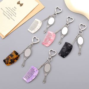 2-in-1 Mini Mirror and Comb <b>Compact</b> Car Bag Purse Pendant Charm Phone Keychain Accessory & <b>Makeup</b> Tool - Product Image 4