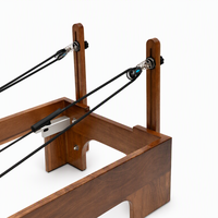 Reformer Pilates en bois de noyer avec demi-tournebroche, certifié CE, machine commerciale pour studio de Pilates de luxe