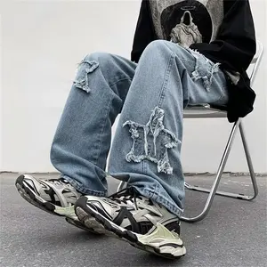 Celana jins pria bordir handuk bintang mode baru 2023 celana Jeans pria longgar coklat celana panjang katun Hip Hop lurus Pantalon Homme