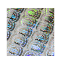 Autocollant d'hologramme de sécurité PET auto-adhésif pour l'authentification des produits de parfum amélioré au laser et l'étiquette de sécurité anti-effraction