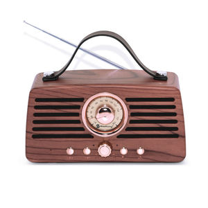 NR4013 ลำโพงไม้แบบพกพาสไตล์เรโทร วิทยุ FM พร้อมเสาอากาศ แบตเตอรี่แบบชาร์จไฟได้ อุปกรณ์เสียงไร้สาย - Product Image 1