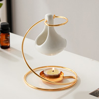 Diffuseur d'arômes créatif semi-artisanal en céramique dorée en forme de goutte d'eau, lampe à huile essentielle, chauffe-cire pour bougies d'intérieur