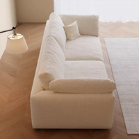 Canapé compact trois places en tissu Rhine, garni d'éponge chenille, style Wabi-sabi, design linéaire, blanc crème, directement de l'usine