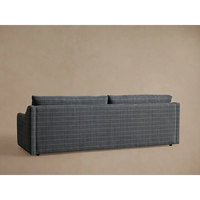 Canapé modulaire de luxe pour salon, simplicité moderne, accoudoirs inclinés, coussins généreux, cadre en bois stratifié