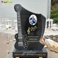Tombeau de pierre tombale de guitare en marbre noir de cimetière simple