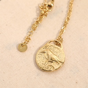 สร้อยคอจี้รูปนกและโลมาสองด้าน ชุบทอง ทำจากสแตนเลสสตีลวินเทจ - Product Image 1