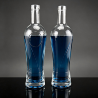 Bouteille en verre transparente ronde haute de 700 ml, personnalisée en usine, pour l'emballage de whisky, brandy, tequila, rhum et autres spiritueux
