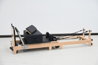 Machine de Pilates pliable en bois durable avec design portable réglable pour les entraînements à domicile et en studio de Pilates