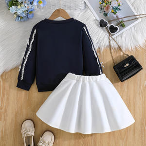 Nouveau costume de marché de loisirs pour filles de printemps et d'automne en gros Haut à manches longues de couleur unie + jupe blanche 4-8 ans - Product Image 2