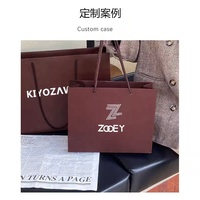 Sacs en papier brun imprimés au détail personnalisés de luxe avec logo personnalisé pour vêtement