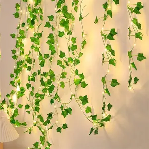 कृत्रिम हरे पौधों की थोक प्लास्टिक किस्म की दीवार के लिए दीवार-घुड़सवार रतन