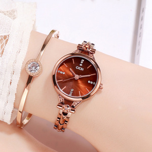 Montre à bracelet en acier pour femmes, étanche, à grand cadran, à la mode, simple, avec diamants incrustés, bracelet fin, style britannique - Product Image 3