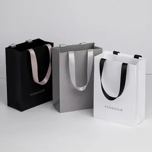 <span class=keywords><strong>Stampa</strong></span> su misura il tuo Logo borsa di carta per lo Shopping di marca di lusso per abbigliamento cosmetico scarpe da regalo borsa Boutique con manico a nastro - Product Image 4