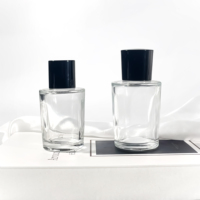 Bouteilles en verre rondes uniques en forme de cylindre 50ml 75ml conteneur cosmétique atomiseur bouteille d'huile d'olive bouteille de parfum en verre