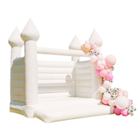 Château gonflable commercial blanc en PVC avec souffleur d'air pour mariages et événements