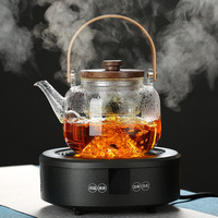 Théière en verre Teabloom de 900 ml, faite à la main, avec infuseur, filtre, poignée en bois, compatible avec les plaques de cuisson, avec bec verseur