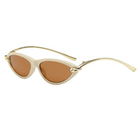 Lunettes de soleil œil de chat pour femmes, haut de gamme, protection UV400, monture métallique, verres colorés en PC, style tendance et personnalité affirmée