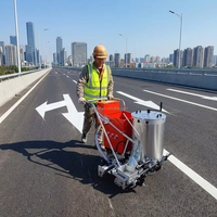 Machine de marquage routier thermoplastique à poussée manuelle pour la traçage des lignes de chaussée sur autoroutes et parkings