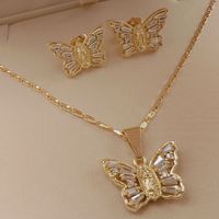JML Nuevo y Hermoso Juego de Joyería de Lujo para Mujer con Aretes de Mariposa y Zirconia, Collar con Colgante de la Virgen María, Bañado en Oro de 14K para Fiestas y Bodas