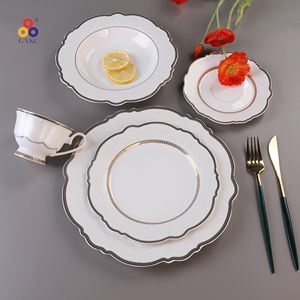GXKC Service de table de luxe en porcelaine fine de Chine haute qualité Nouvelles assiettes en or gaufrées Tasses à thé et sauce pour la maison ou le mariage - Product Image 5