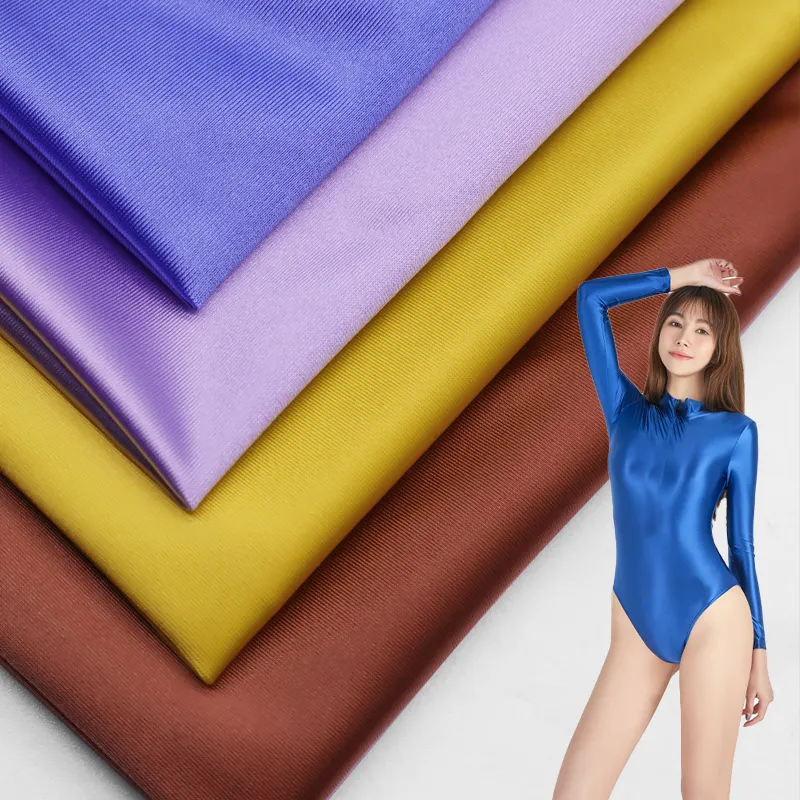 Venta al por mayor urdimbre brillante 76% nylon poliamida 24% spandex tejido elástico traje de baño para bikini traje de baño