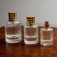 Vente en gros de flacons en verre pour cosmétiques, parfums et mascara, avec logo personnalisé, rayures verticales de luxe, bouchon en platine de haute qualité, pompe à vaporiser
