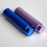 Atomiseur de parfum rechargeable en aluminium violet-bleu de 10 ml, surface givrée, à mécanisme rotatif, vente en gros directe usine, écologique, pour emballage