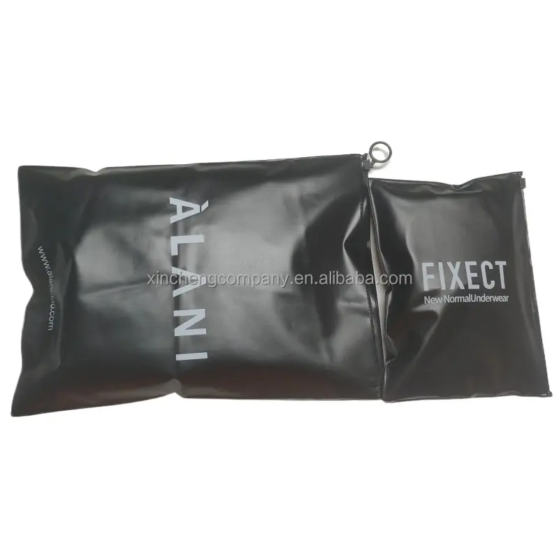 Bolso con cremallera de plástico negro Bolso con cremallera de PVC de alta calidad Bolso con cremallera negro para ropa