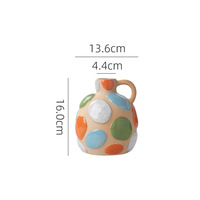 Vase en céramique circulaire peint à la main, style nordique moderne, émaillé coloré, pièce décorative haut de gamme pour bureaux de vente, salons et salles à manger