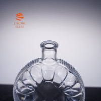 Bouteille en verre cristal ronde de 700 ml avec bord perlé, idéale pour le brandy, le whisky et les emballages cadeaux haut de gamme
